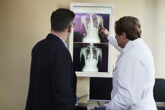 doctor reviewing x-rays